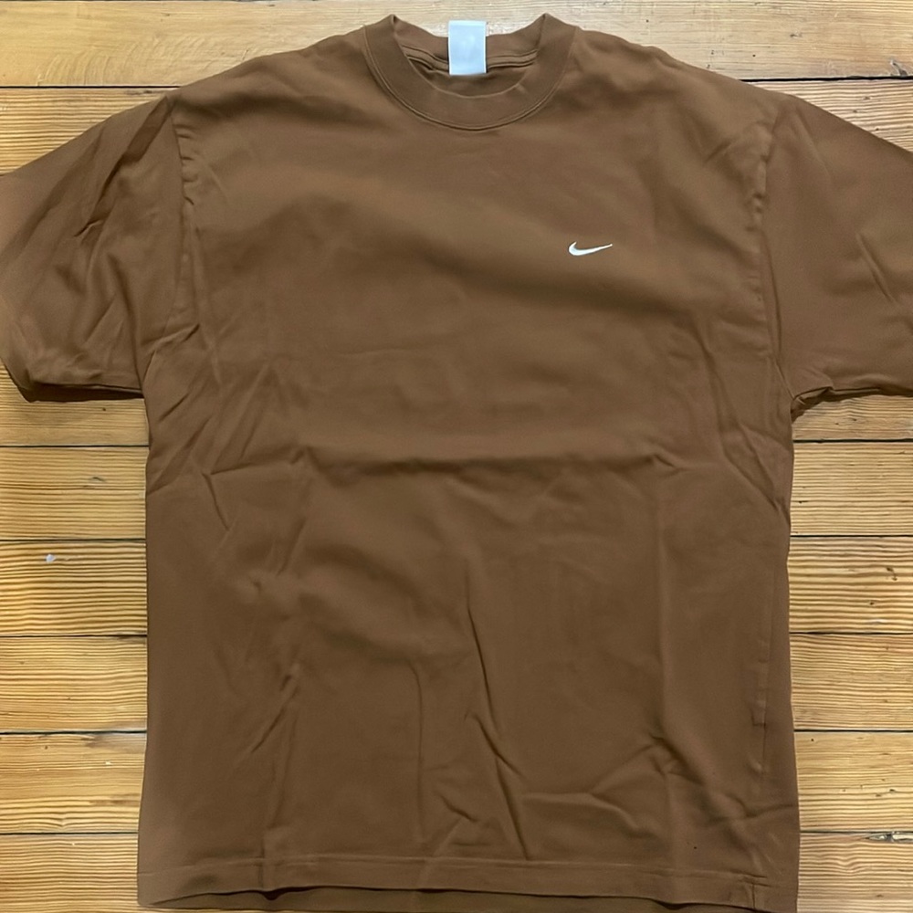 Sellin a nike shirt